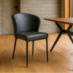 Silla de Comedor Tapizada Gris Símil Piel Estructura Metal Negro 59x80x55 cm